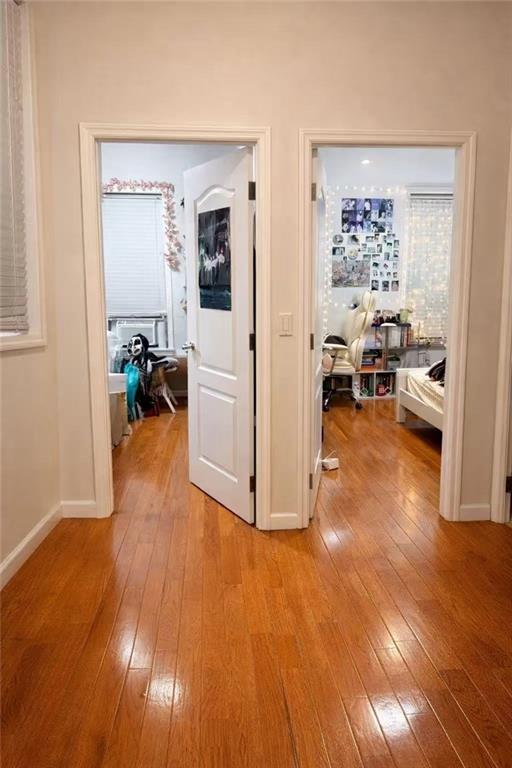 5409 6th Avenue Brooklyn, NY 11220 - Photo 6 of 12 a view of a livingroom with furniture and hardwood floor