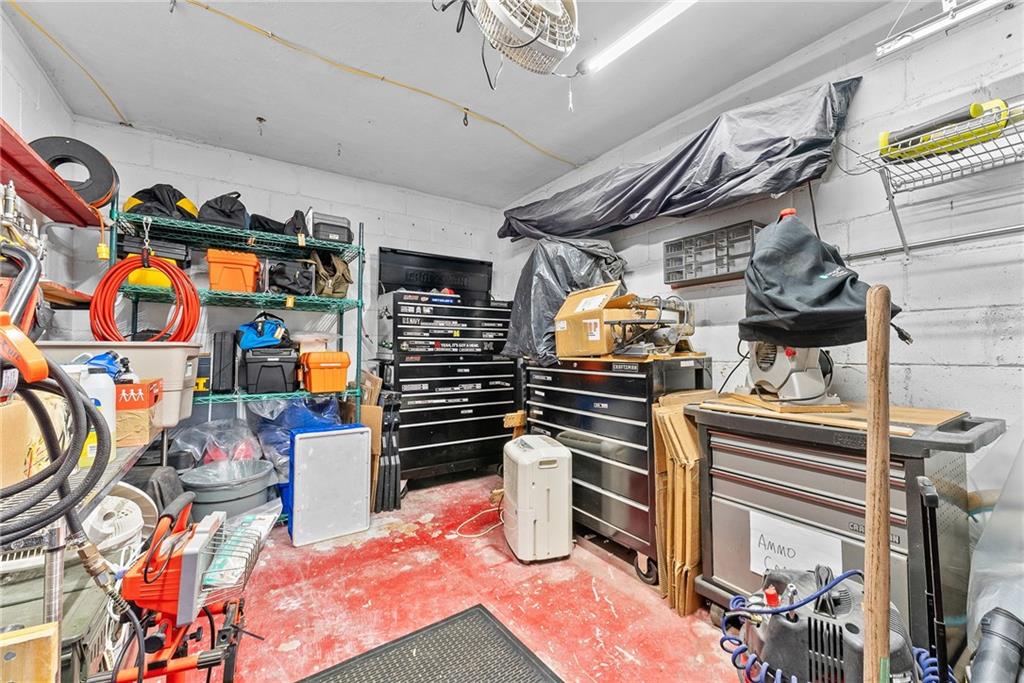 762 Scott Road Pittsburgh, PA 15228 - Photo 30 of 39 Large clean and dry garage currently used as a workshop and storage area.