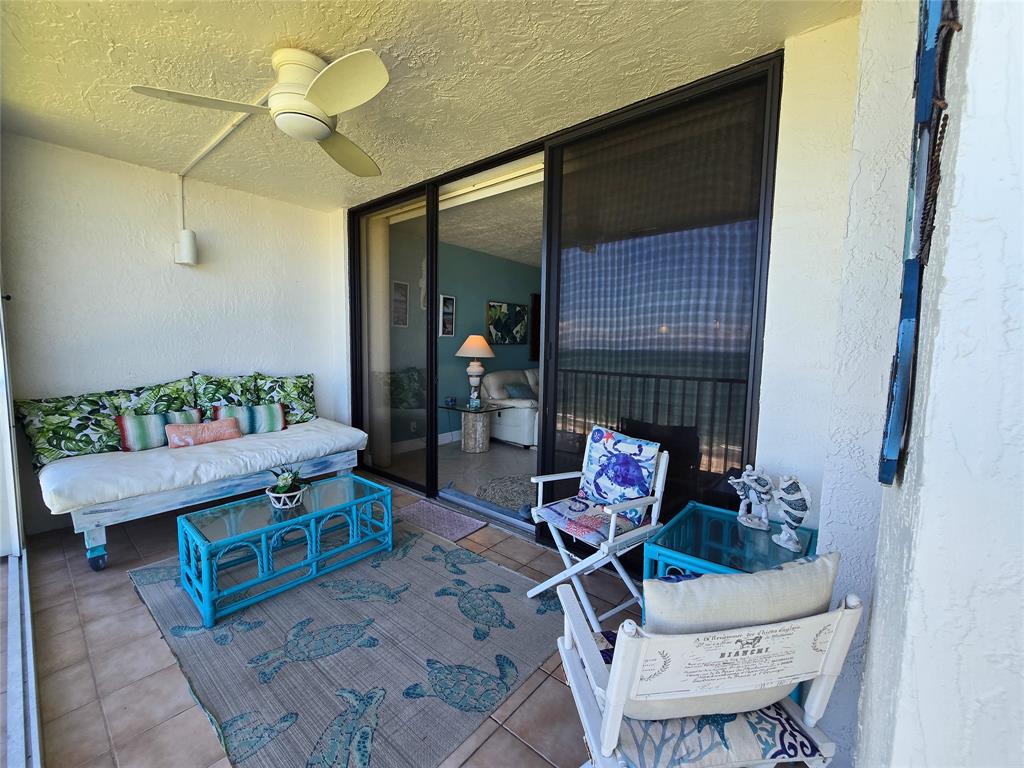 3120 North Hwy A1A, Unit 1302 Fort Pierce, FL 34949 - Photo 11 of 33 a living room with furniture and a potted plant