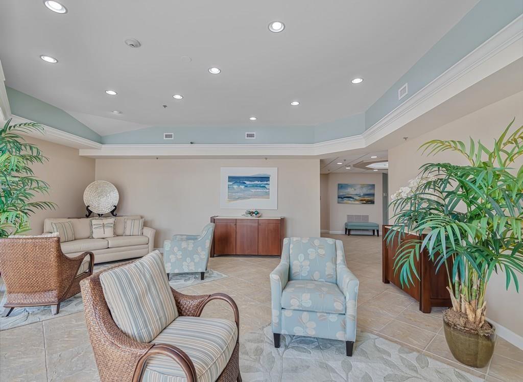 3120 North Hwy A1A, Unit 1302 Fort Pierce, FL 34949 - Photo 29 of 33 a living room with furniture potted plant and a window