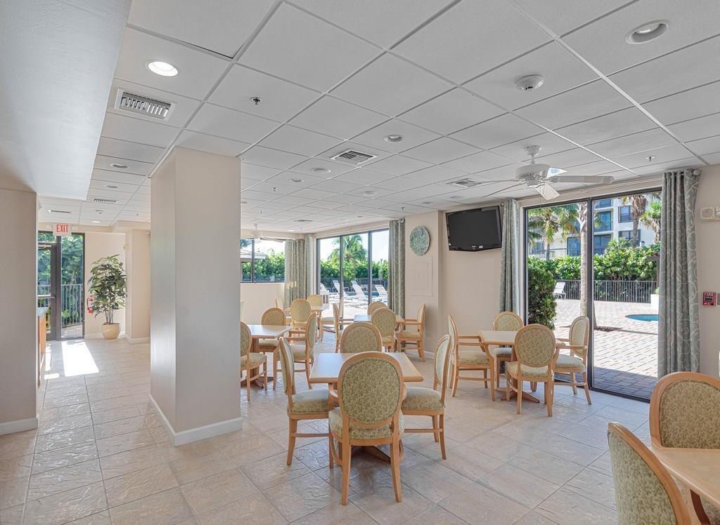 3120 North Hwy A1A, Unit 1302 Fort Pierce, FL 34949 - Photo 31 of 33 a view of a dining room with furniture window and outside view