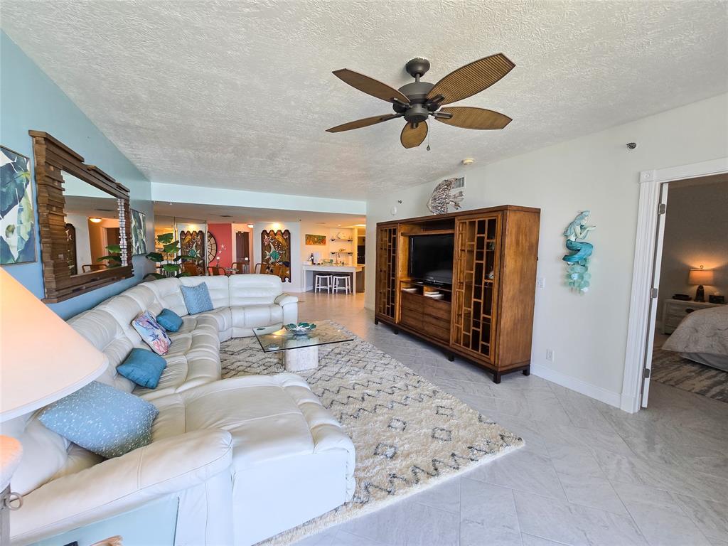 3120 North Hwy A1A, Unit 1302 Fort Pierce, FL 34949 - Photo 8 of 33 a living room with furniture and a window