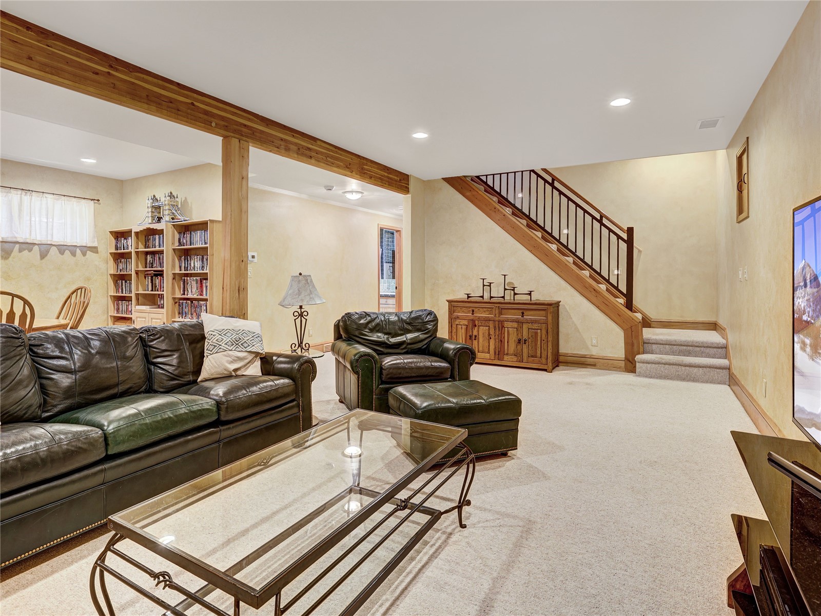 840 Penstemon Road Keystone, CO 80435 - Photo 34 of 50 Basement living room featuring carpet flooring, recessed lighting, and stairs