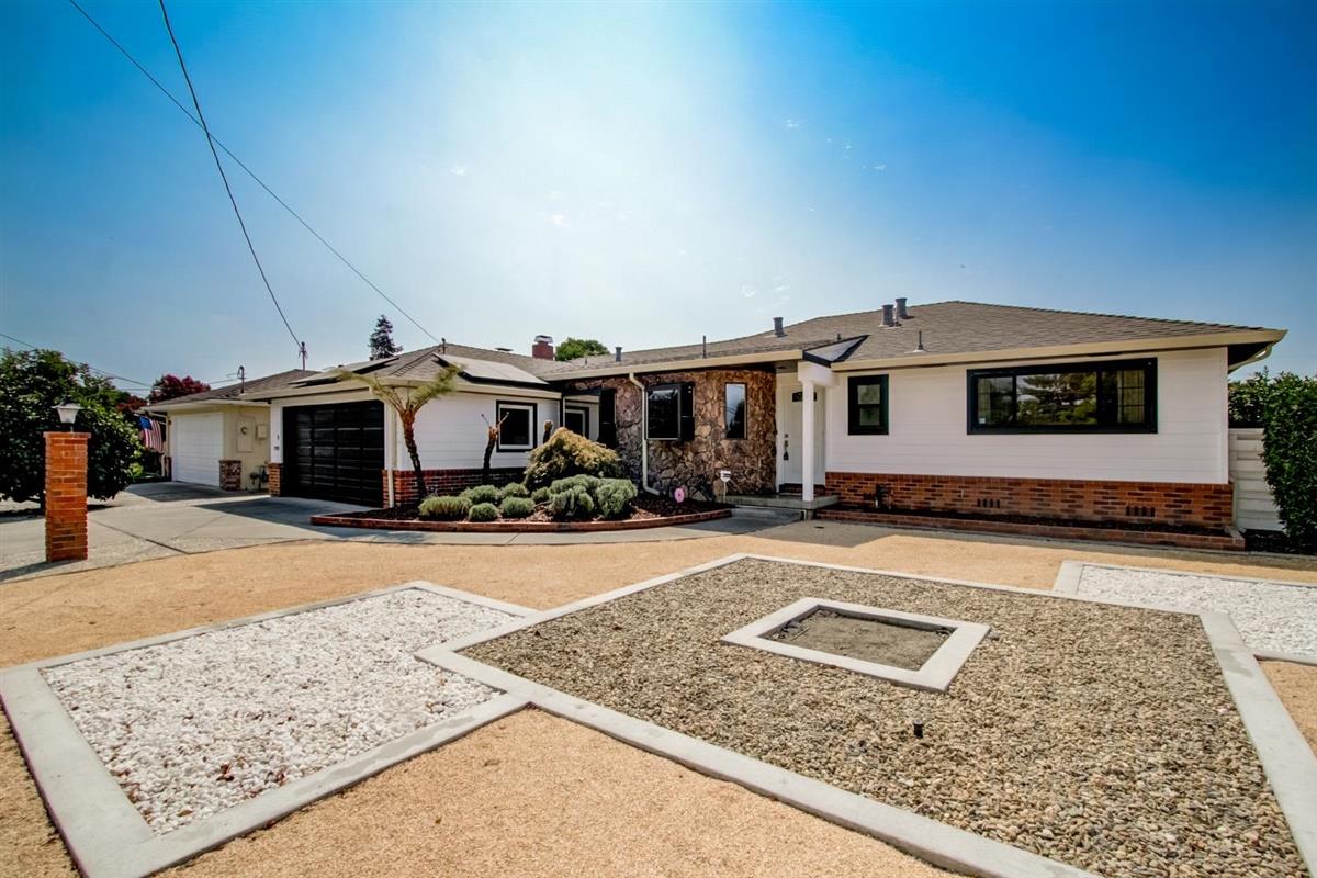 38061 Blacow Road Fremont, CA 94536 - Photo 1 of 65 a front view of a house with yard