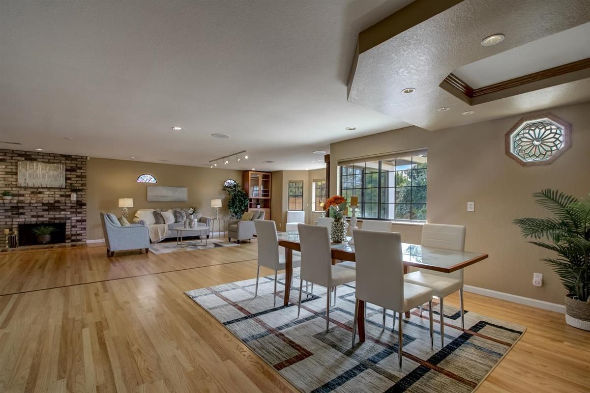 38061 Blacow Road Fremont, CA 94536 - Photo 14 of 65 a living room with furniture and a table