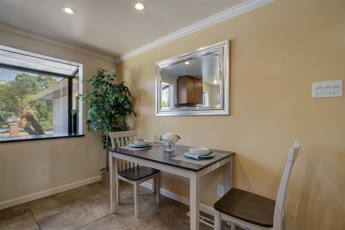 38061 Blacow Road Fremont, CA 94536 - Photo 20 of 65 a dining room with furniture and window