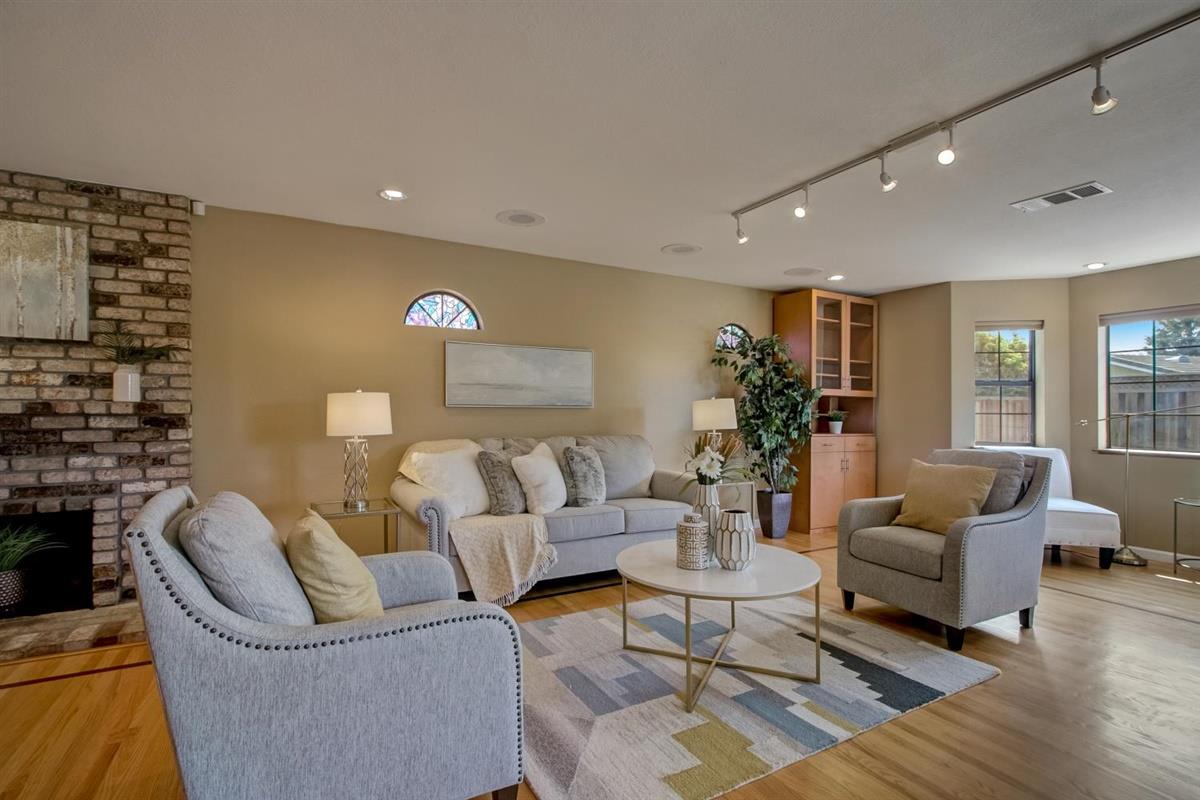 38061 Blacow Road Fremont, CA 94536 - Photo 2 of 65 a living room with furniture and wooden floor
