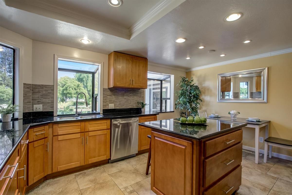 38061 Blacow Road Fremont, CA 94536 - Photo 25 of 65 a kitchen that has a sink and a stove in it