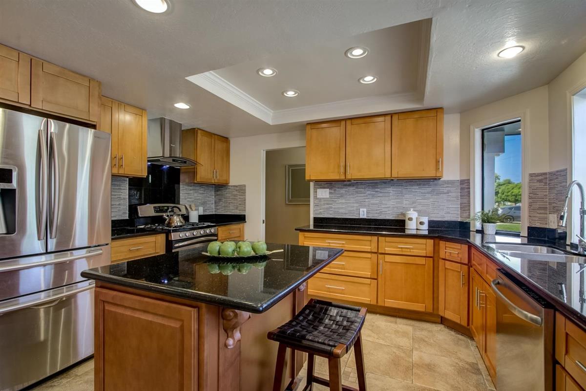 38061 Blacow Road Fremont, CA 94536 - Photo 26 of 65 a kitchen with a sink stove and refrigerator