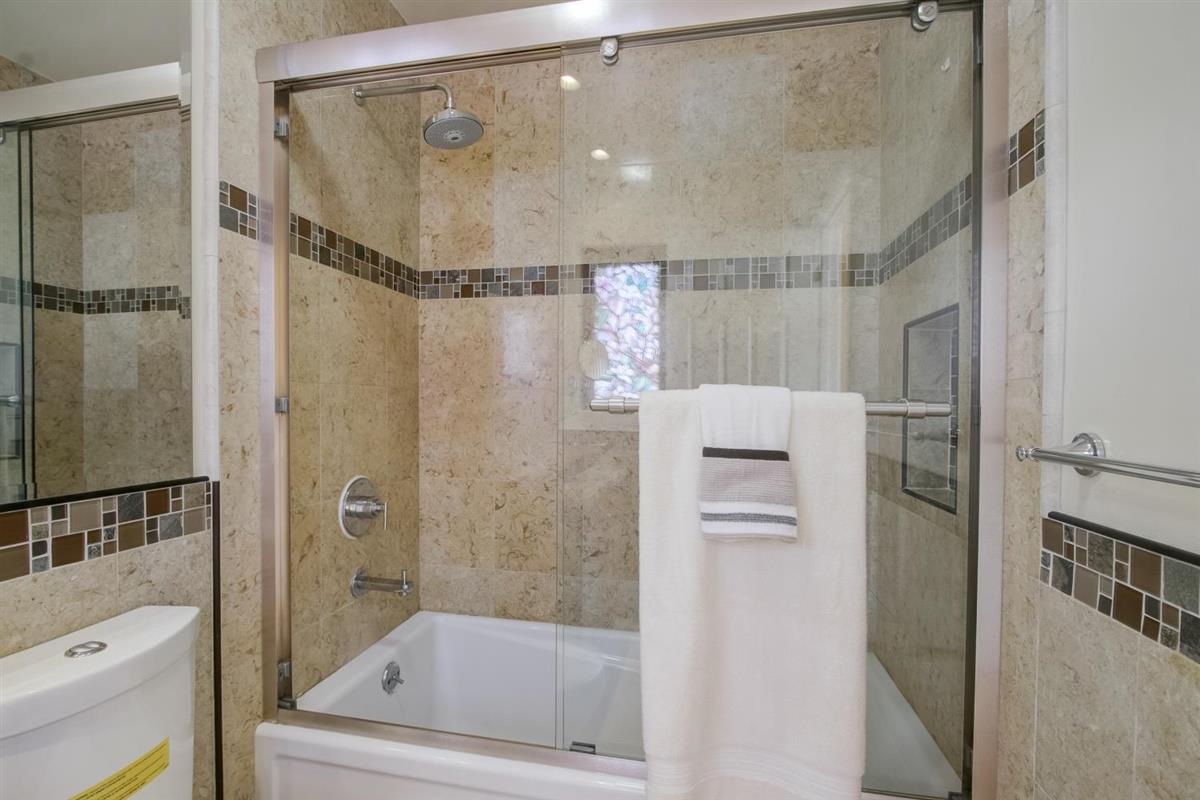38061 Blacow Road Fremont, CA 94536 - Photo 41 of 65 a bathroom with a shower and a tub