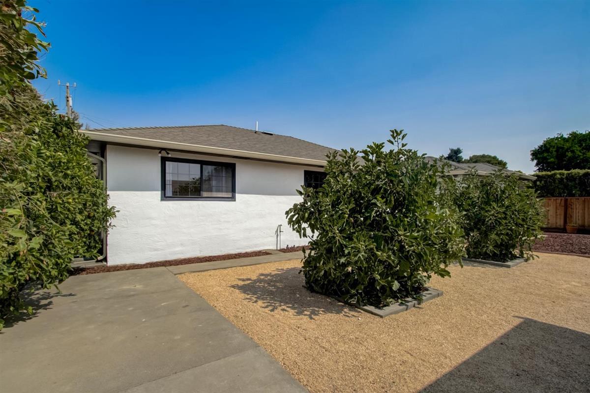 38061 Blacow Road Fremont, CA 94536 - Photo 55 of 65 a front view of a house with a yard