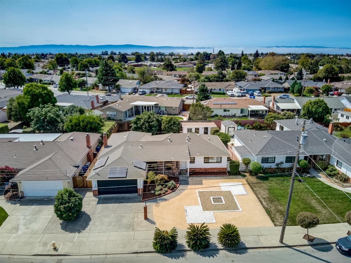 38061 Blacow Road Fremont, CA 94536 - Photo 63 of 65 an aerial view of a house with parking space