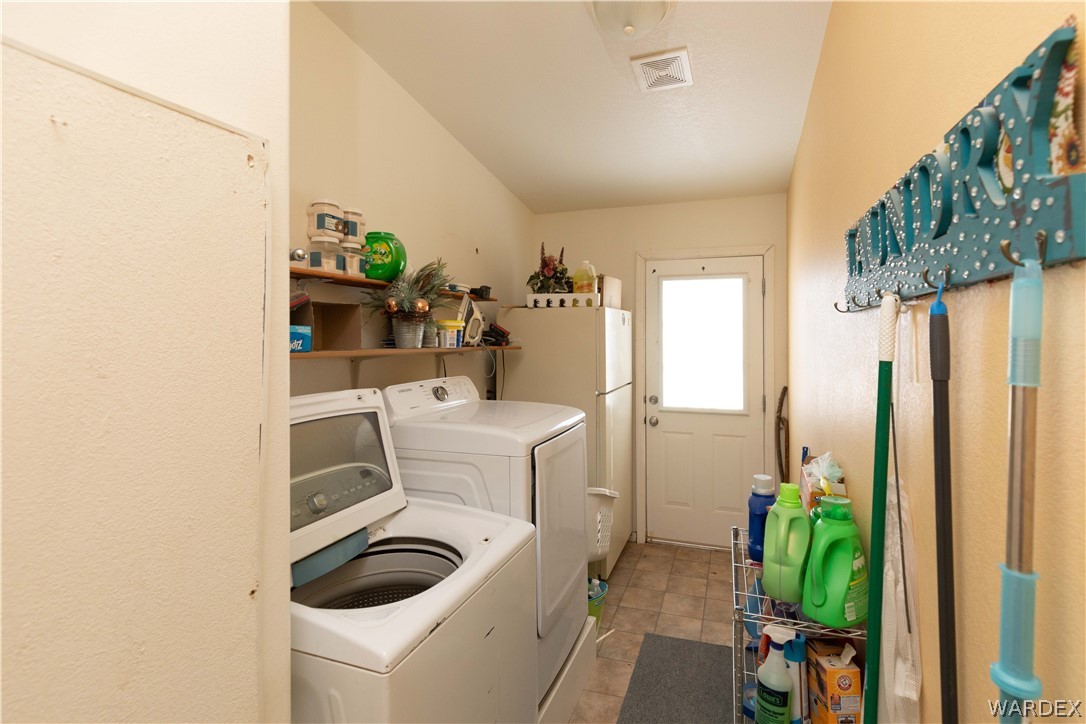 1464 South Dragoon Road Golden Valley, AZ 86413 - Photo 25 of 47 a room with storage and utility