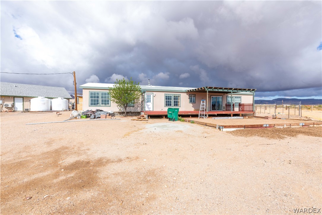 1464 South Dragoon Road Golden Valley, AZ 86413 - Photo 32 of 47 a view of building with a street