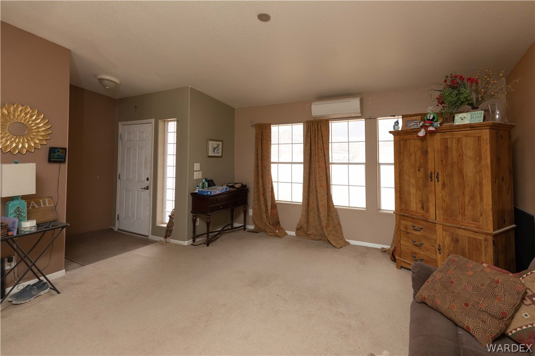 1464 South Dragoon Road Golden Valley, AZ 86413 - Photo 10 of 47 wooden floor and windows in a room