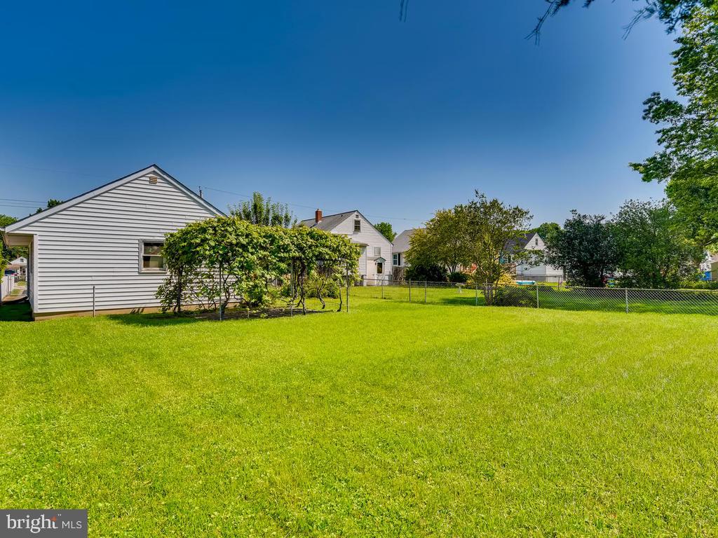 947 Woodlynn Road Baltimore, MD 21221 - Photo 1 of 36 REAR YARD: 3BR/1 FULL BA/2HALF BATHS w/GARAGE