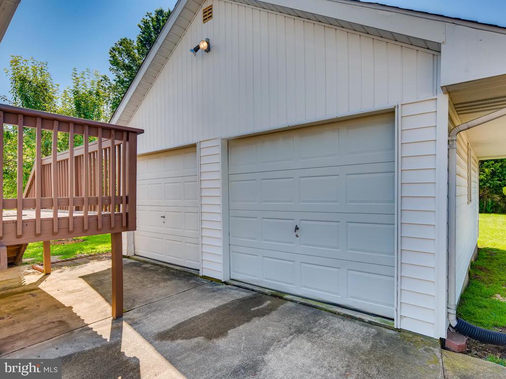 947 Woodlynn Road Baltimore, MD 21221 - Photo 29 of 36 Garage w/electric, pull-down stairs for storage