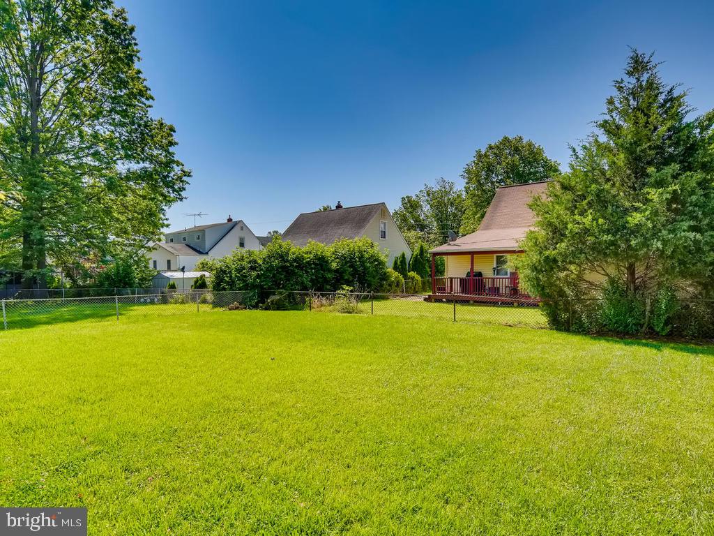 947 Woodlynn Road Baltimore, MD 21221 - Photo 35 of 36 3BR/1 FULL/2 HA BA + OVERSIZED GARAGE: HUGE YARD!!