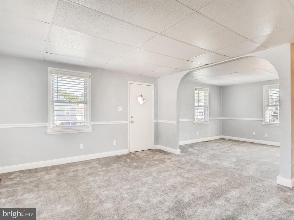 947 Woodlynn Road Baltimore, MD 21221 - Photo 7 of 36 Dining Rm: new carpet, fresh paint, chair molding!