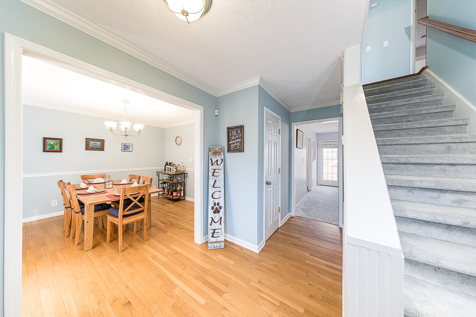3721 Trough Springs Road Adams, TN 37010 - Photo 3 of 38 a view of a dining room with furniture and wooden floor