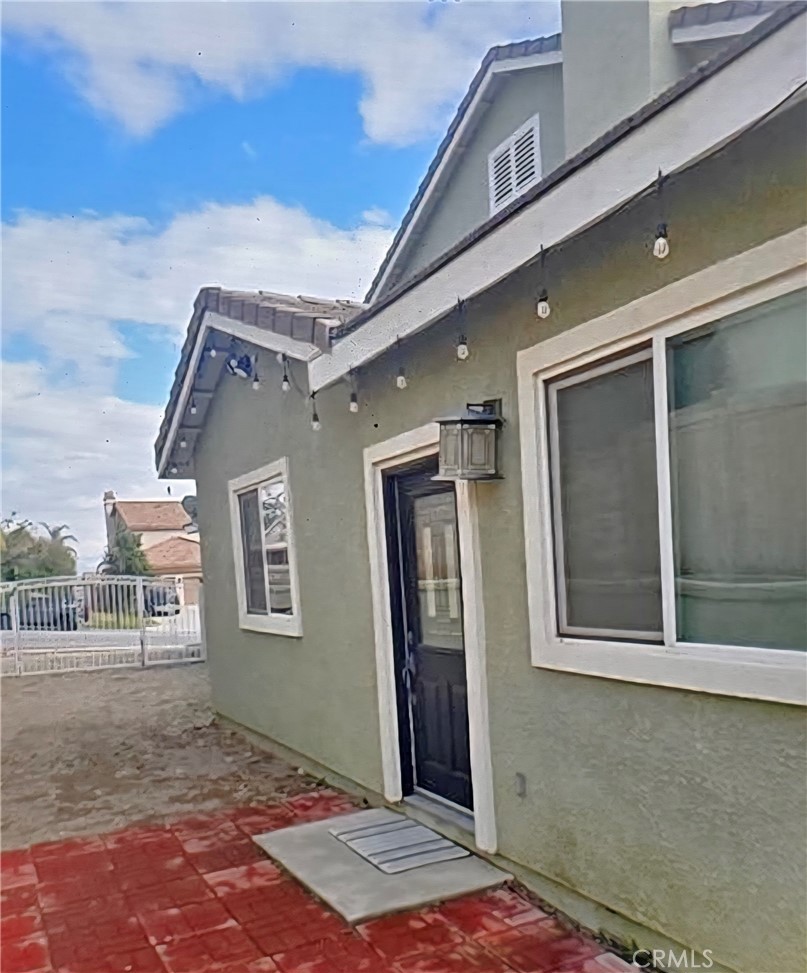 4990 Padre Avenue Rancho Cucamonga, CA 91739 - Photo 23 of 23 a view of a brick house with a door