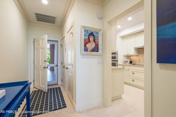 walk in closet with wooden floor