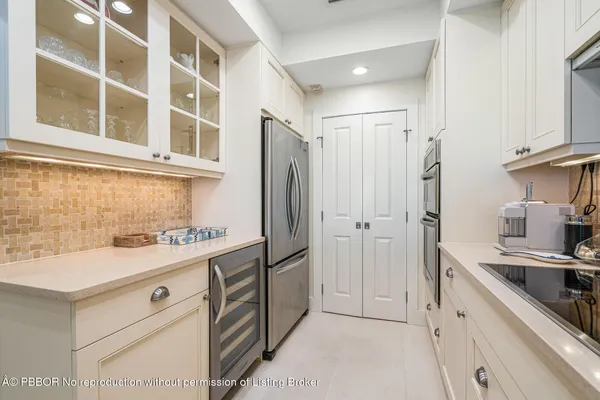 a bathroom with a sink double vanity and a shower