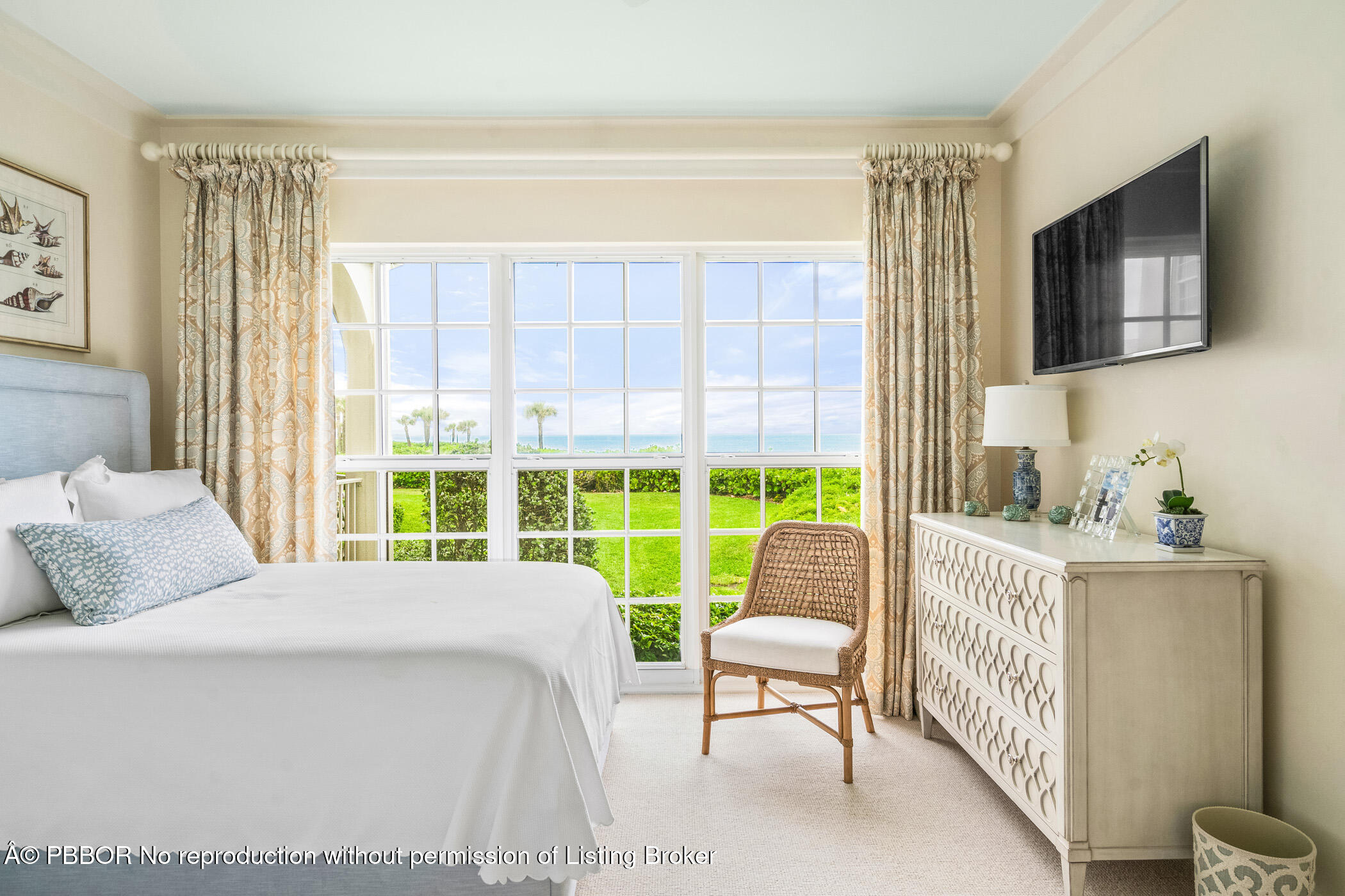 750 Beach Road, Unit 102 Vero Beach, FL 32963 - Photo 19 of 28 a bedroom with a bed and a window