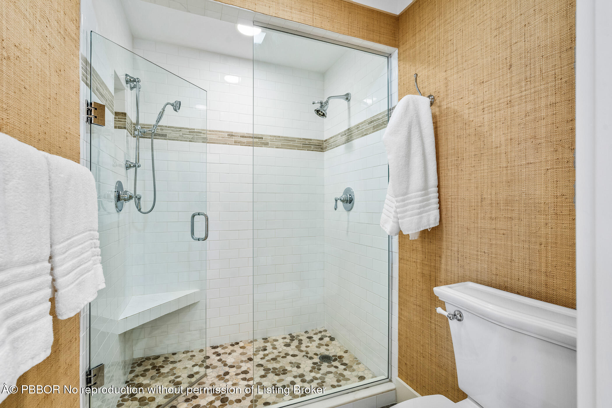 750 Beach Road, Unit 102 Vero Beach, FL 32963 - Photo 26 of 28 a bathroom with a shower and a toilet