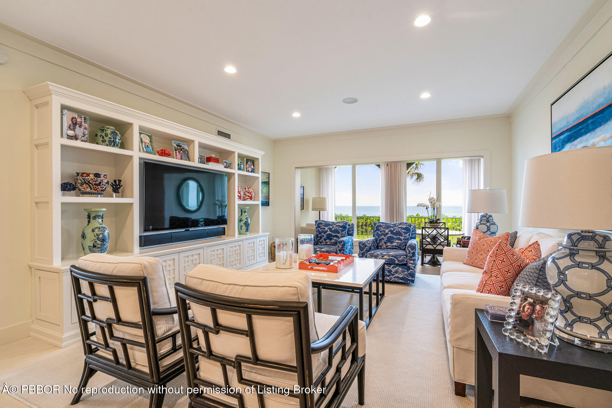 750 Beach Road, Unit 102 Vero Beach, FL 32963 - Photo 4 of 28 a outdoor space with furniture a rug and a window