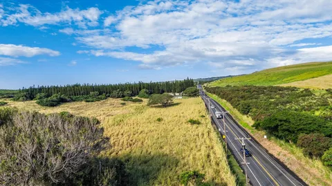 a view of swimming pool from a balcony
