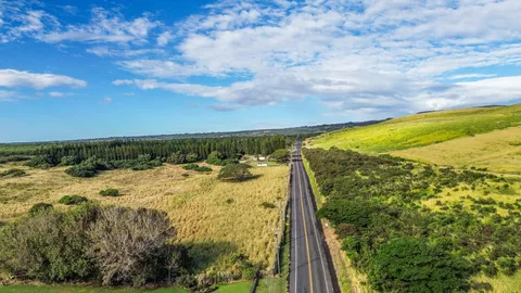 a view of a lake with a yard