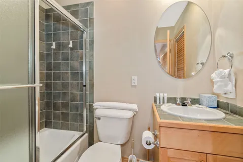 a bathroom with a toilet and a sink