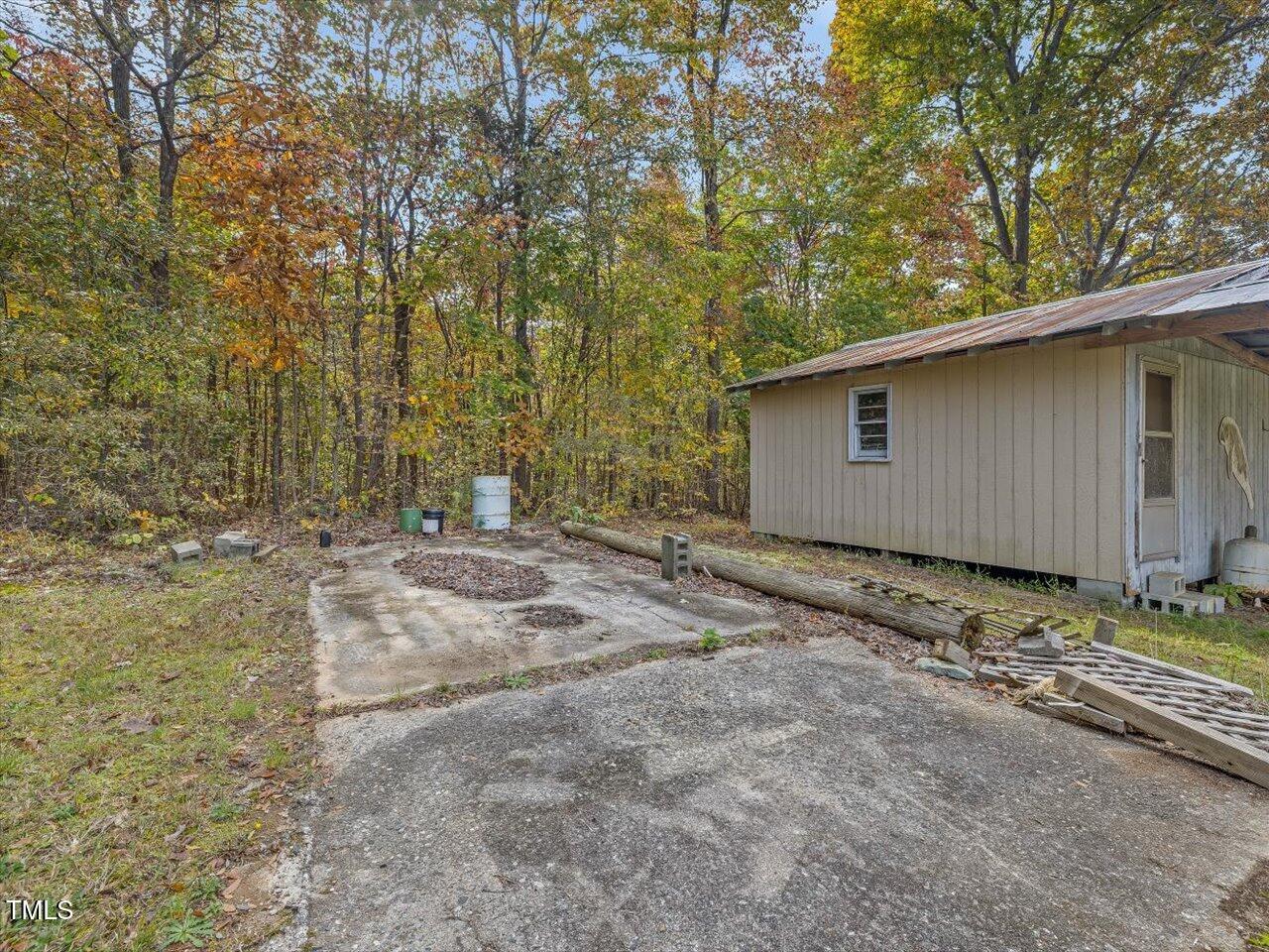 2146 Bowers Store Road Siler City, NC 27344 - Photo 48 of 73 concrete pad next to workshop could be perfect for camper spot. Electric is in the Workshop!
