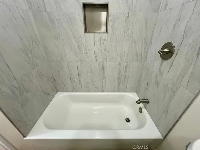 a bathroom with a tub