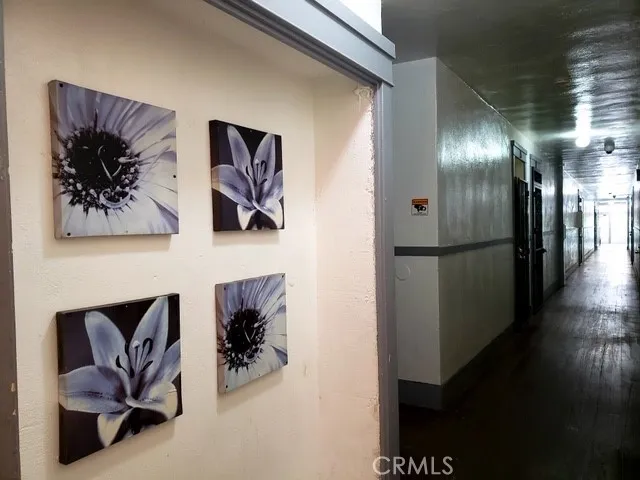 a view of a hallway with workspace