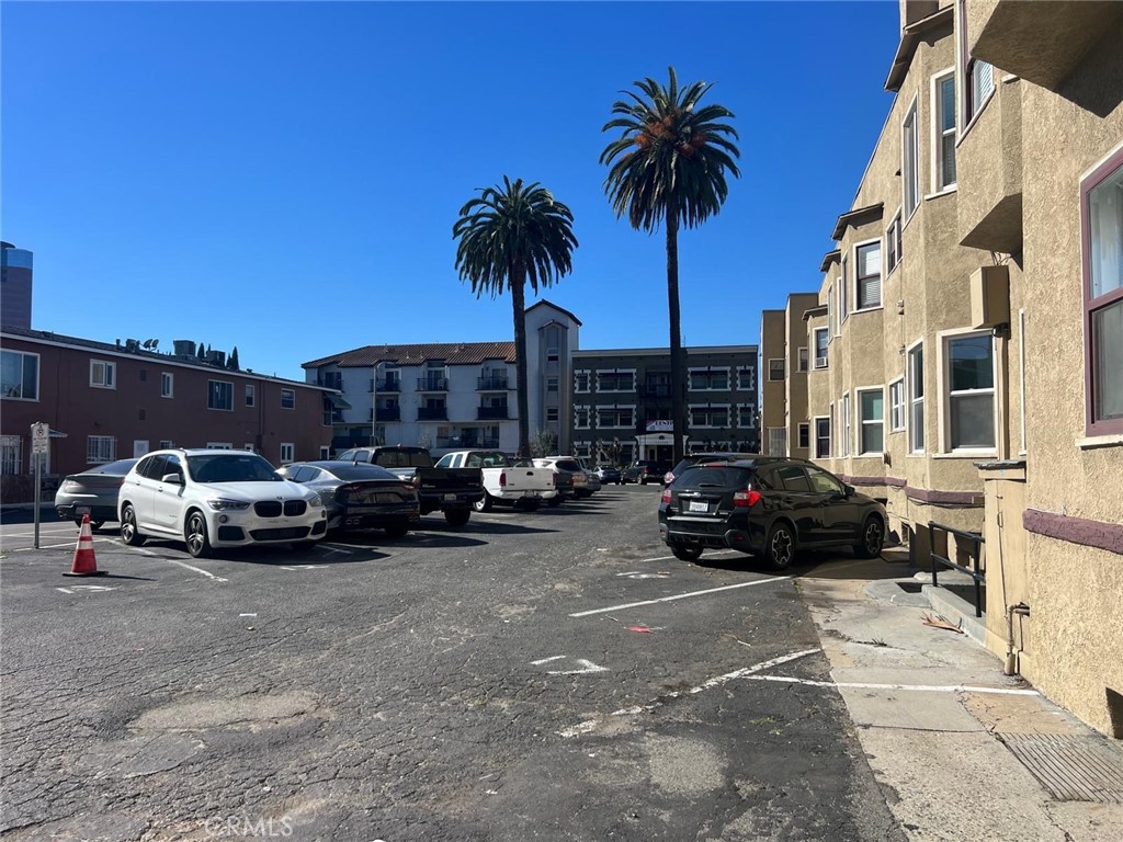 354 Chestnut Avenue, Unit 29 Long Beach, CA 90802 - Photo 18 of 19 a view of car parked in front of a building