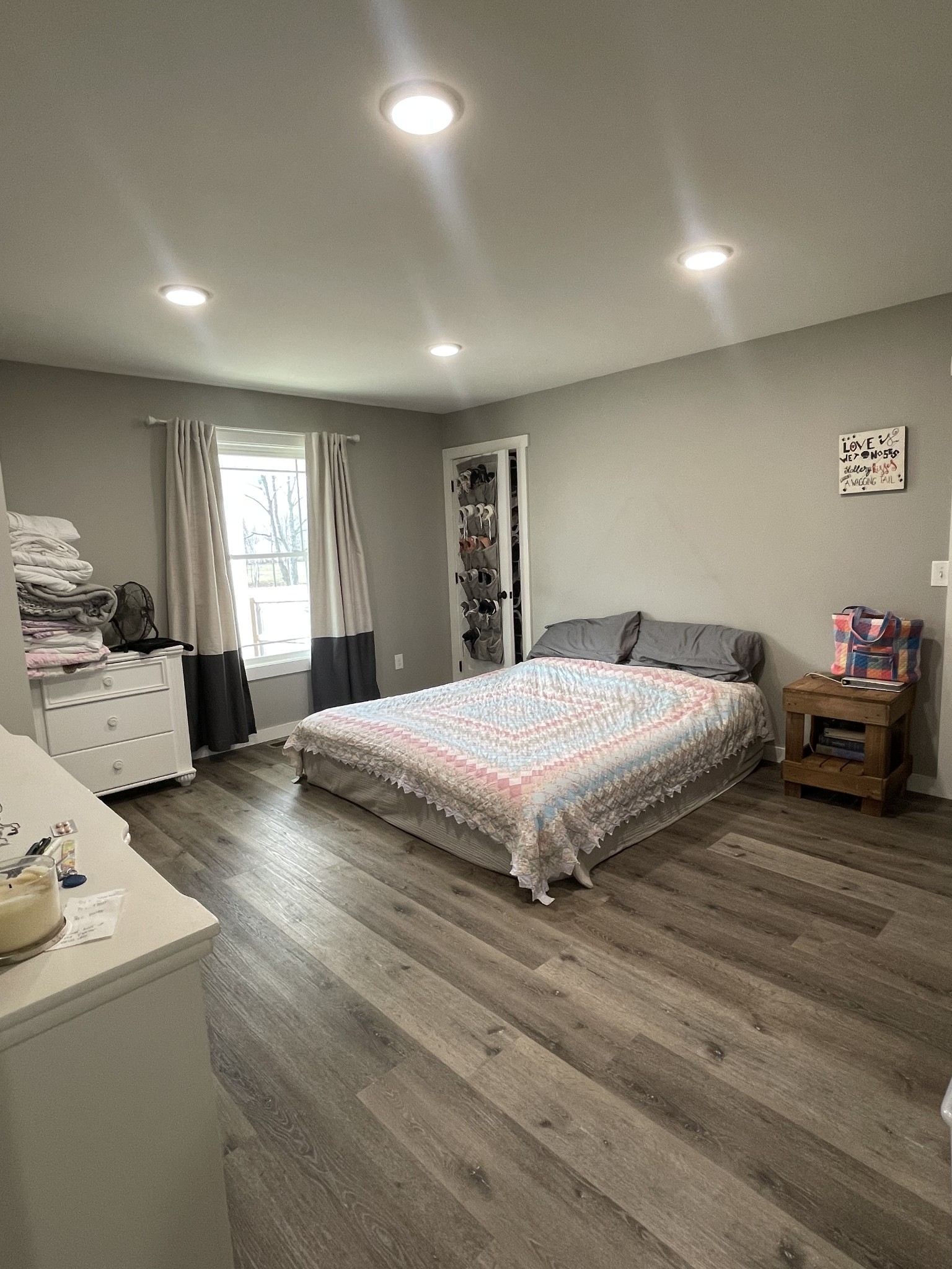 1875 Fall River Road Leoma, TN 38468 - Photo 14 of 18 a spacious bedroom with a bed a couch and large window