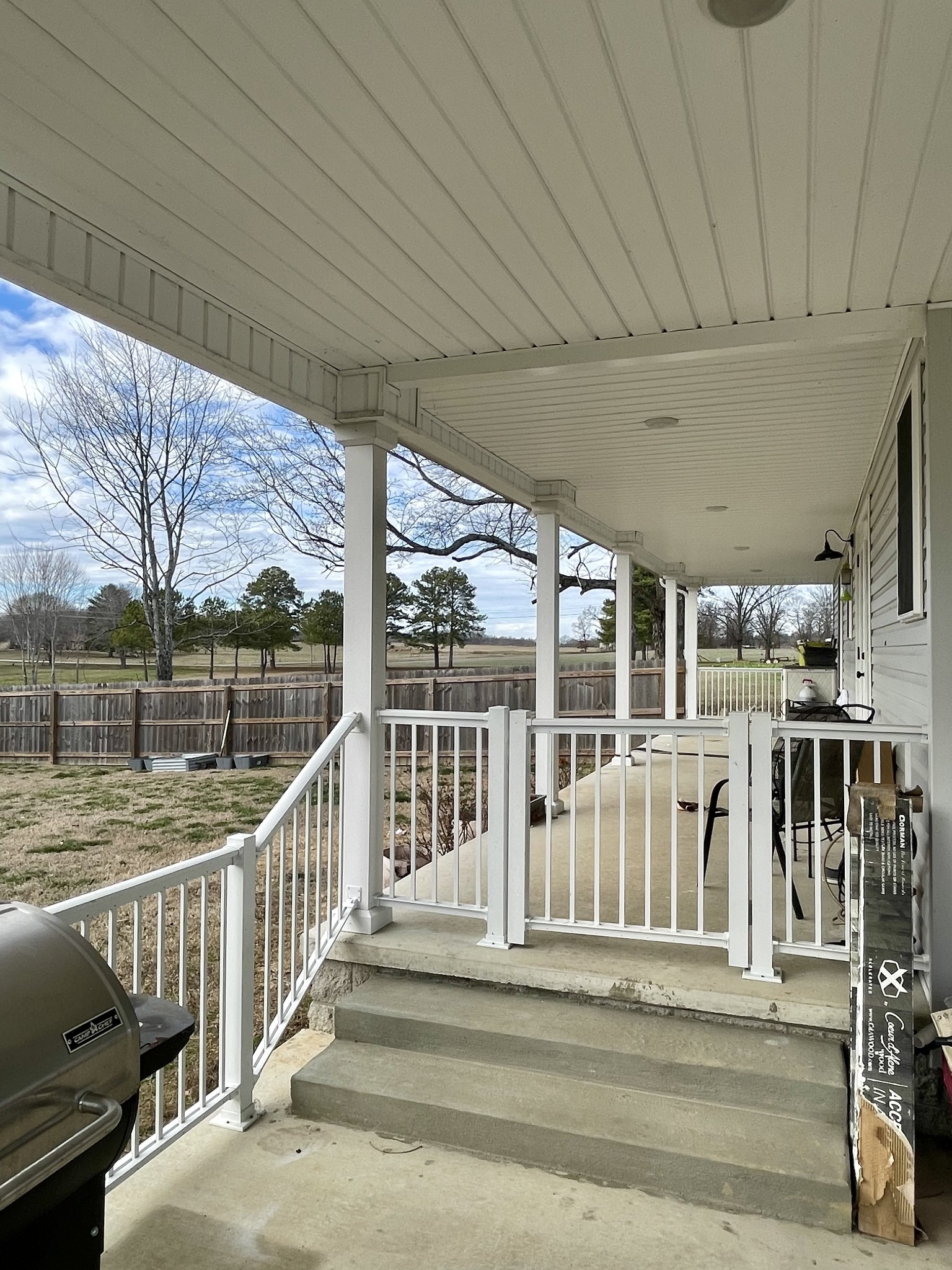 1875 Fall River Road Leoma, TN 38468 - Photo 17 of 18 a view of a porch with wooden floor and iron stairs