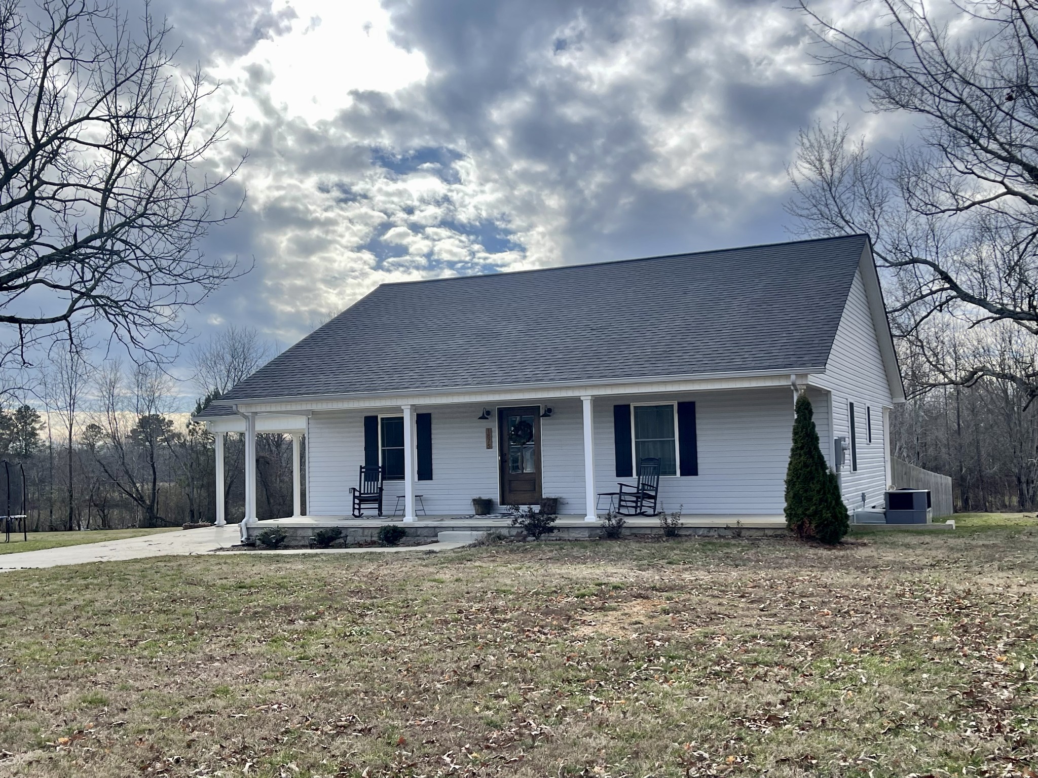 1875 Fall River Road Leoma, TN 38468 - Photo 2 of 18 a front view of house with yard and barbeque oven