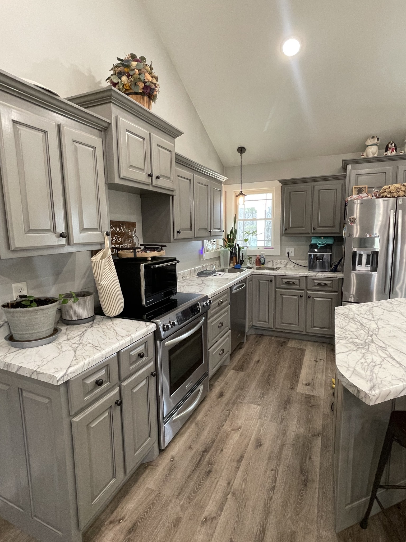 1875 Fall River Road Leoma, TN 38468 - Photo 9 of 18 a kitchen with granite countertop a sink stainless steel appliances and cabinets