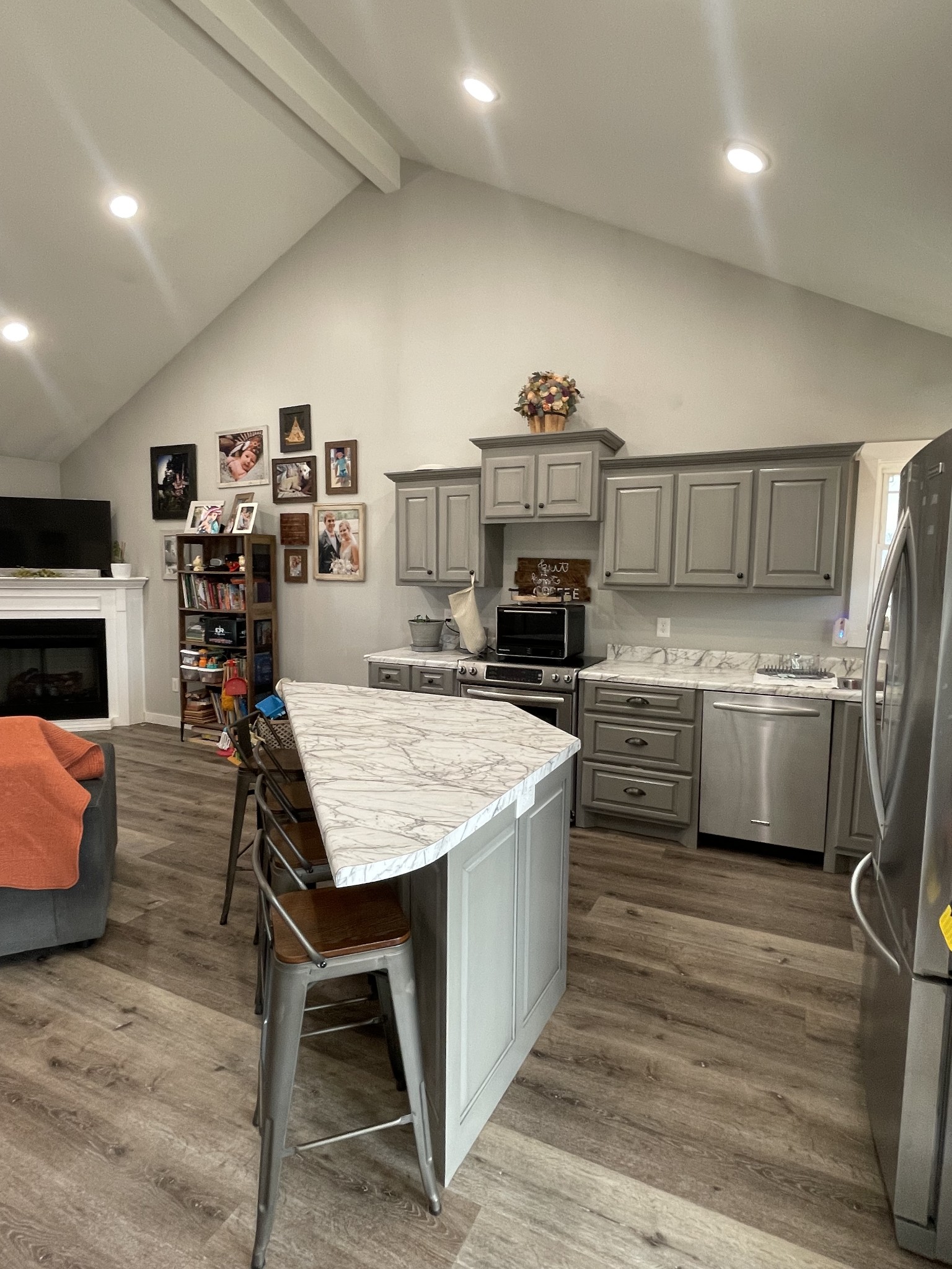 1875 Fall River Road Leoma, TN 38468 - Photo 10 of 18 a kitchen with a table chairs refrigerator and cabinets