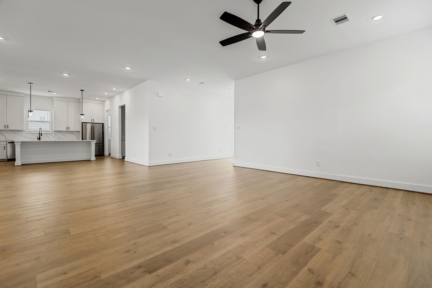 1813 Drover Lane Rosenberg, TX 77471 - Photo 6 of 23 a view of a kitchen with a sink and a window