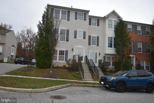 a view of a car park in front of a building