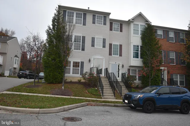 a view of a car park in front of a building