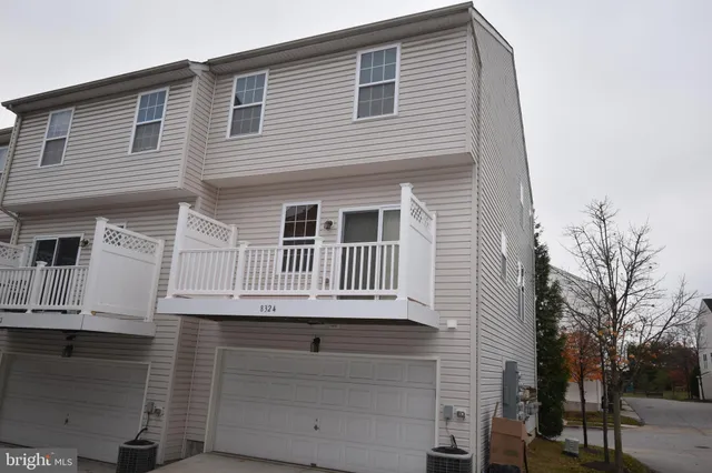 a view of house with roof deck