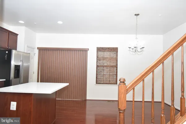 a bathroom with a sink a mirror and a shower