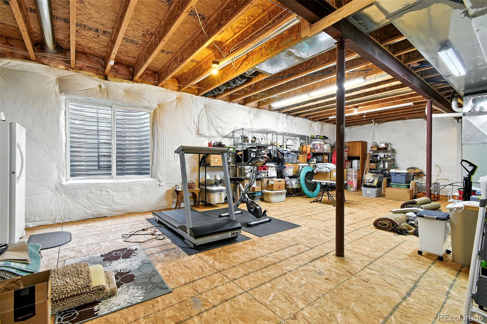 12804 Harrison Street Thornton, CO 80241 - Photo 31 of 37 a view of a patio with table and chairs