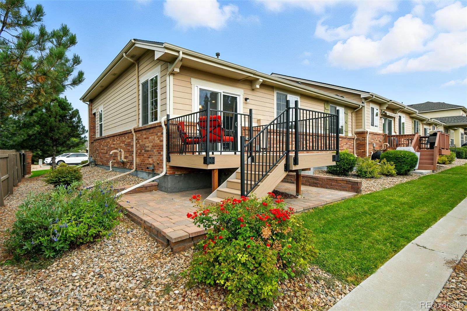 12804 Harrison Street Thornton, CO 80241 - Photo 36 of 37 a front view of house with yard