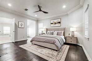 1318 Peden Street, Unit D Houston, TX 77006 - Photo 14 of 33 a spacious bedroom with a bed and a painting on the wall
